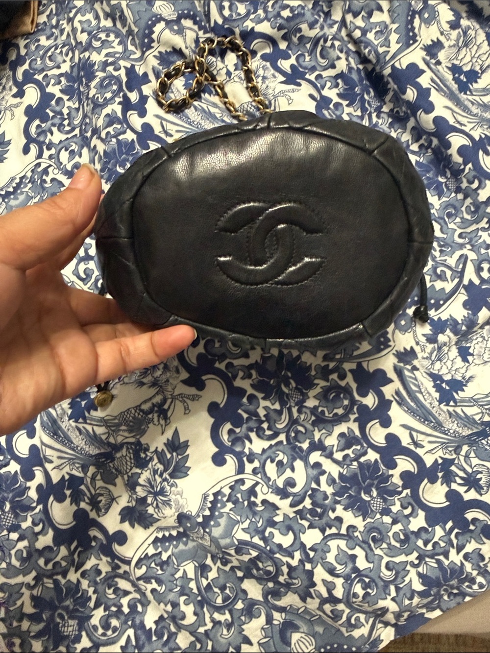 CHANEL Black Quilted Leather Drawstring Mini Shoulder Bag with Gold Chain - Picture 2 of 10